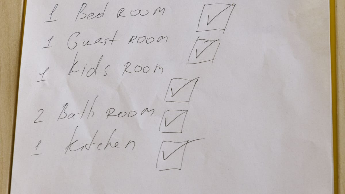 A checklist page clipped to a white clipboard.