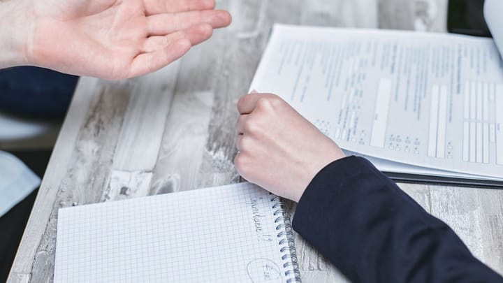 Documents spread out on a table.