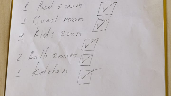 A checklist page clipped to a white clipboard.