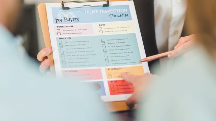 A checklist on a clipboard, photographed from above.
